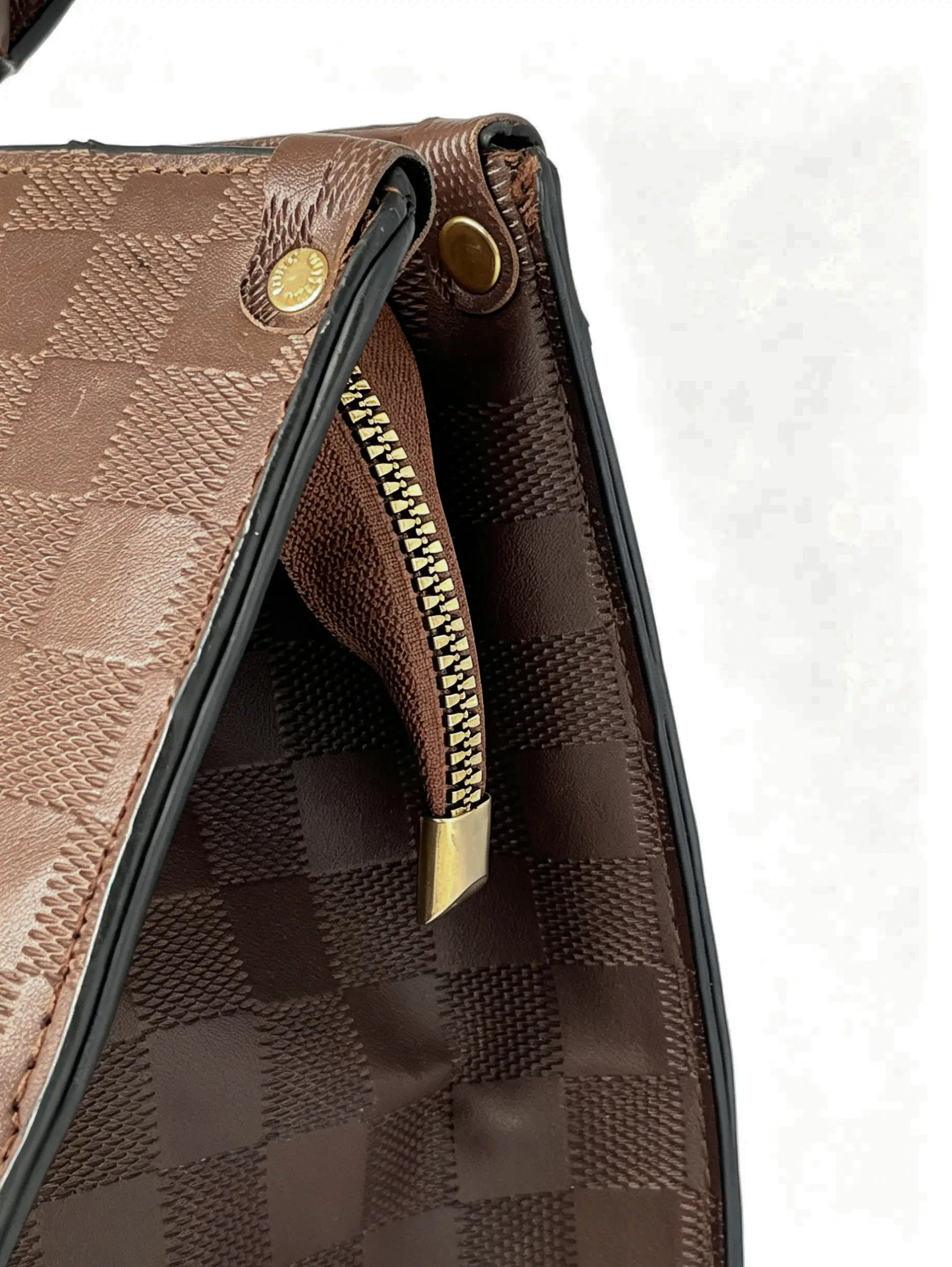 Large handbag with checkerboard embossing and gold metal details