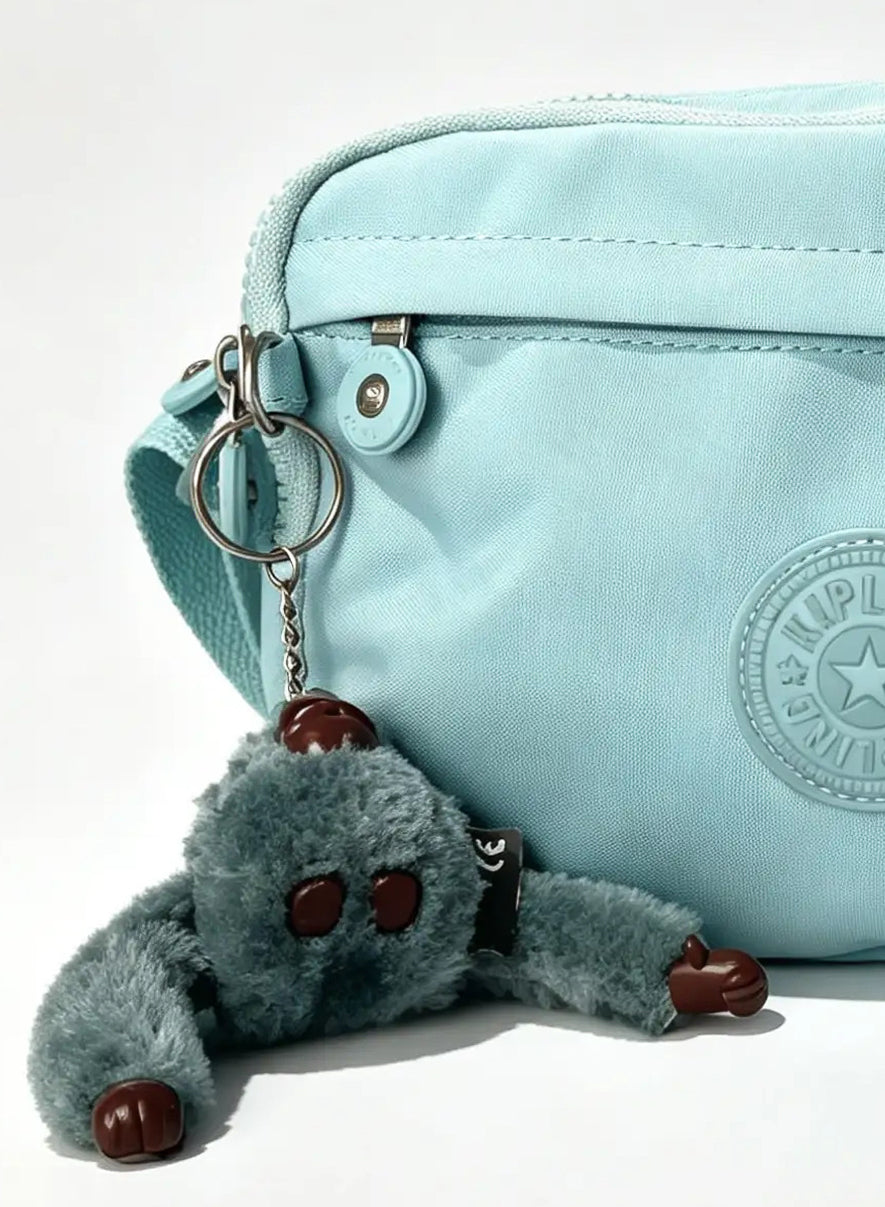 شنطة كروس صغيرة أزرق سماوي بميدالية حيوان | Small Sky Blue Crossbody Bag with Animal Charm