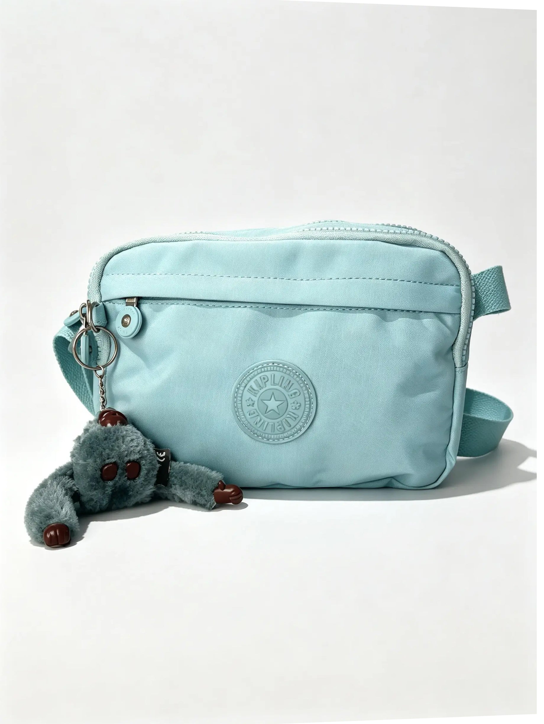 شنطة كروس صغيرة أزرق سماوي بميدالية حيوان | Small Sky Blue Crossbody Bag with Animal Charm