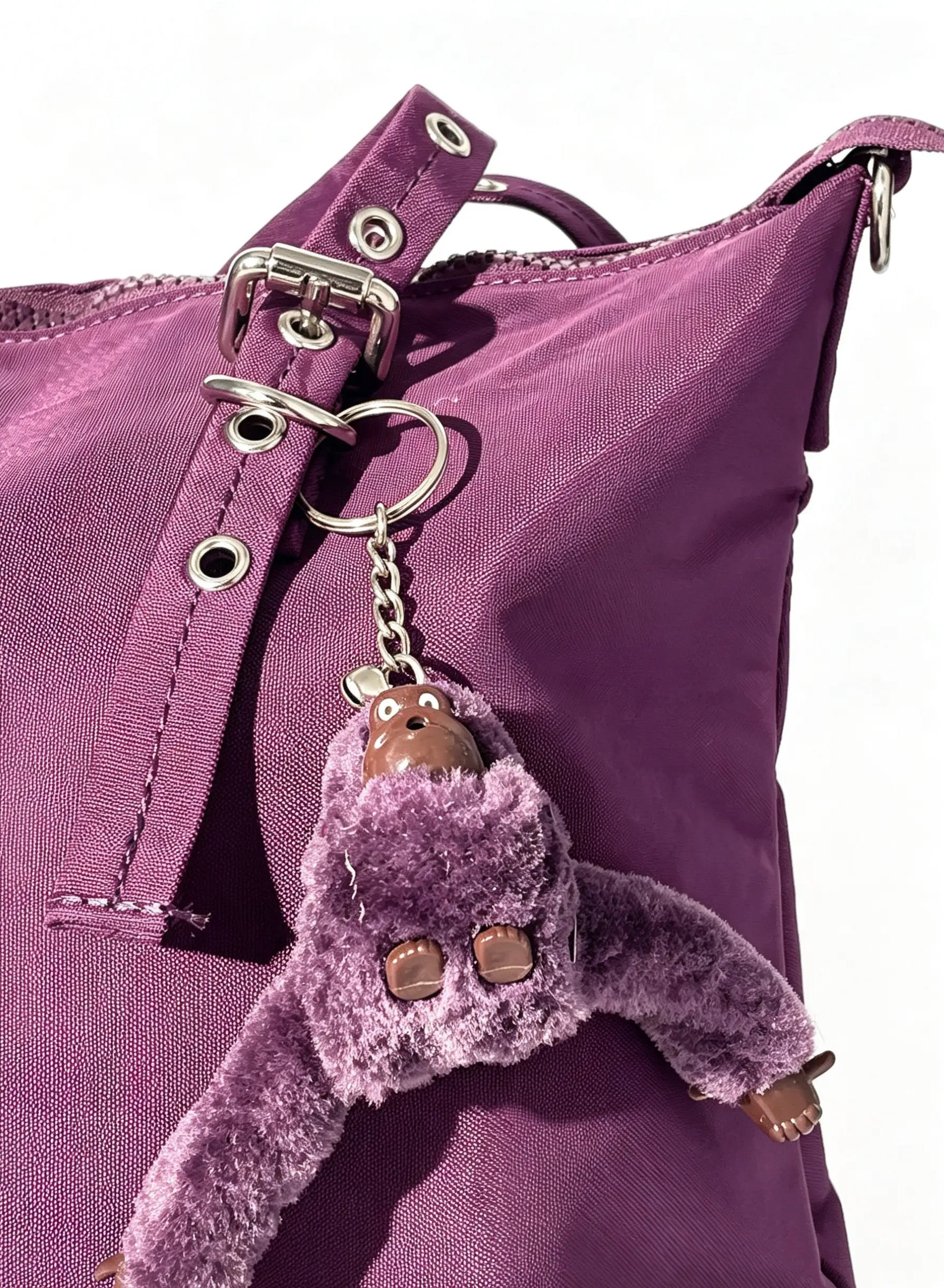 Large Purple Women's Tote Bag with Long Handles and Elegant Metal Hardware شنطة يد حريمي كبيرة بنفسجي بيدين طويلة وتفاصيل معدنية أنيقة