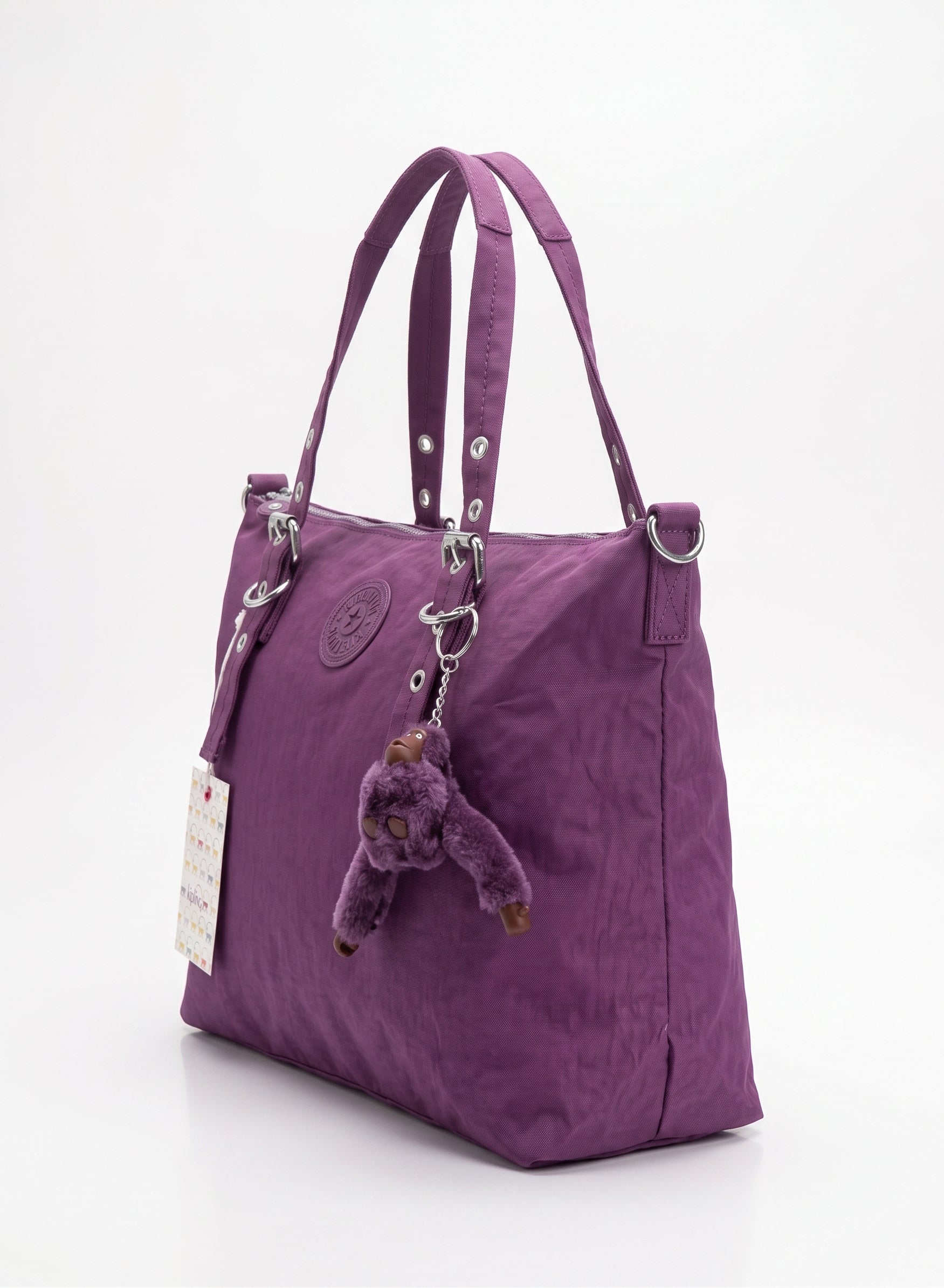 Large Purple Women's Tote Bag with Long Handles and Elegant Metal Hardware شنطة يد حريمي كبيرة بنفسجي بيدين طويلة وتفاصيل معدنية أنيقة