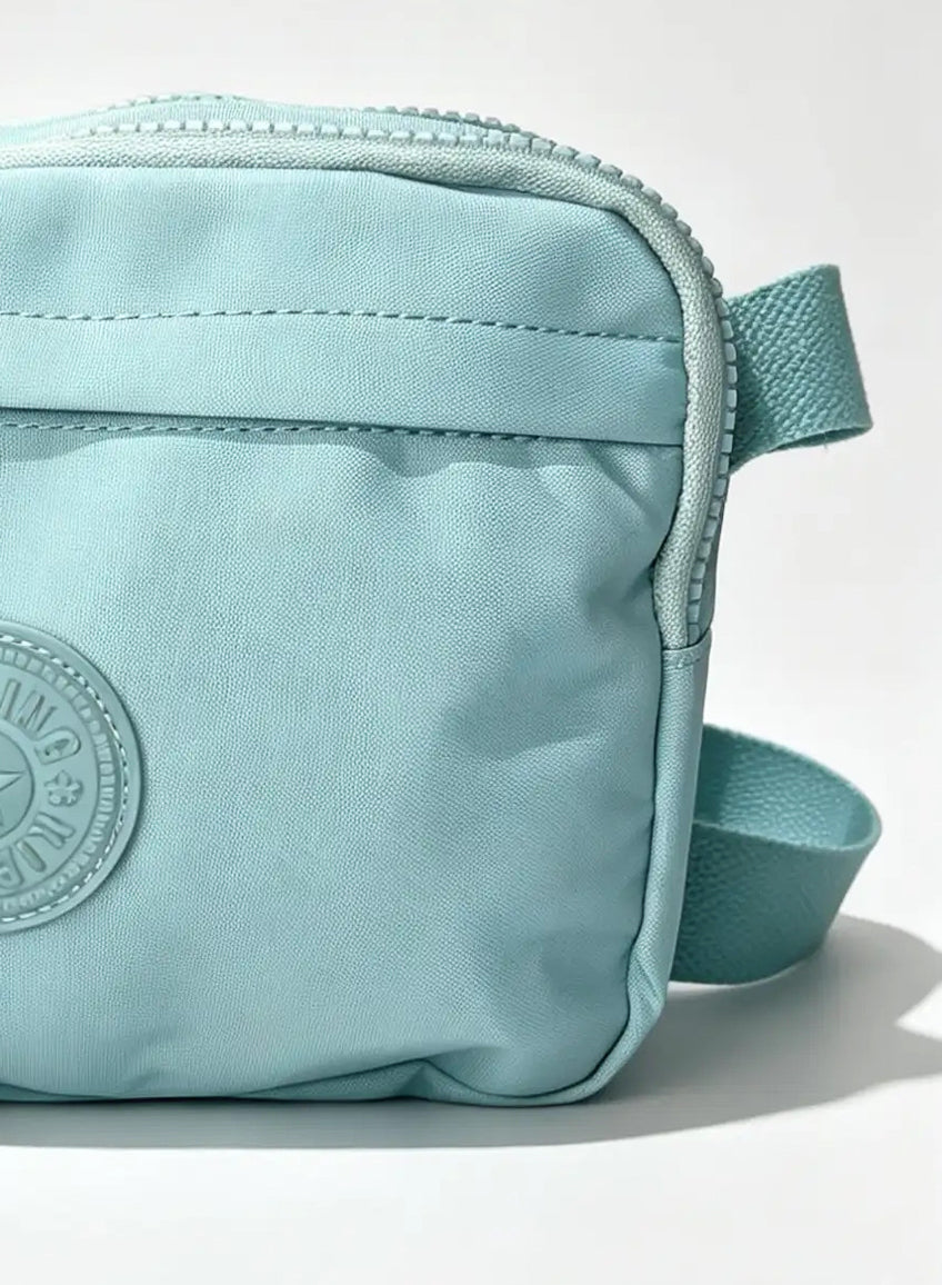شنطة كروس صغيرة أزرق سماوي بميدالية حيوان | Small Sky Blue Crossbody Bag with Animal Charm