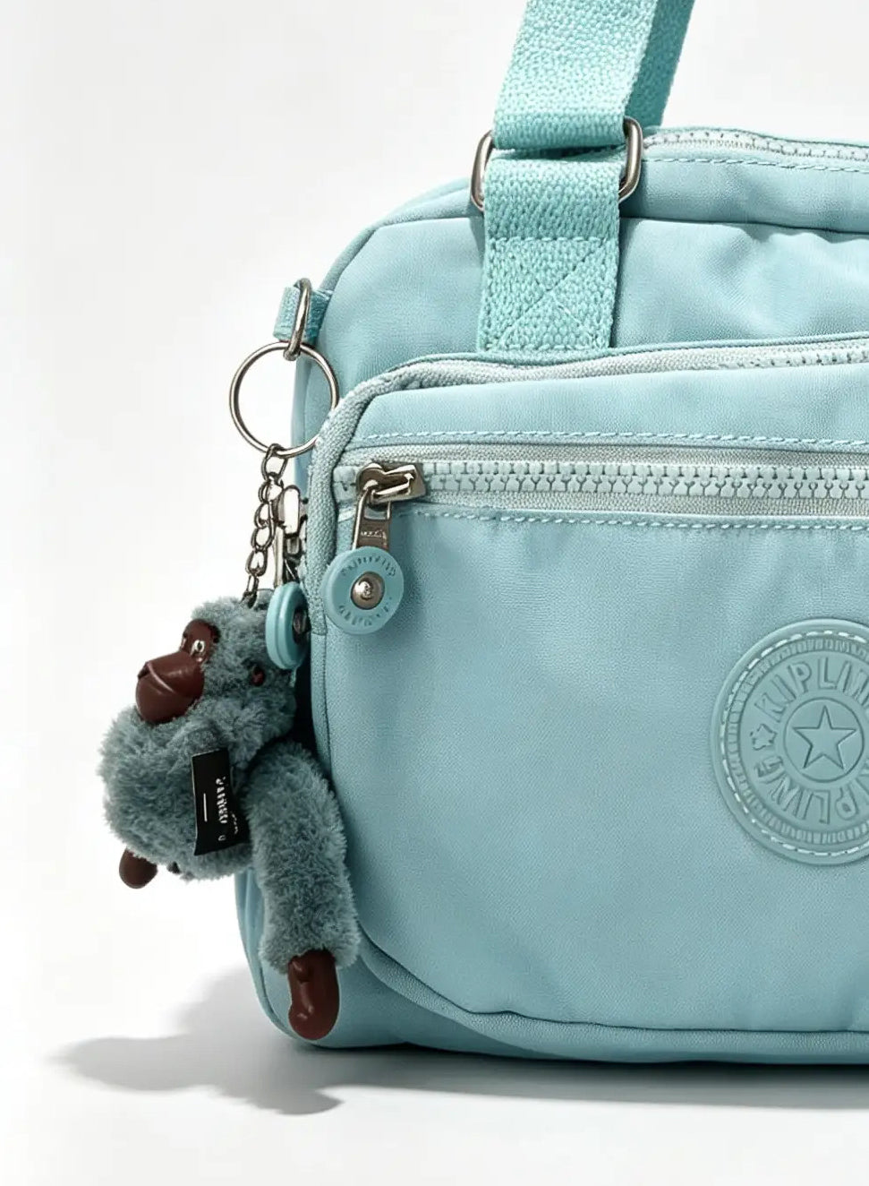 شنطة كروس صغيرة أزرق سماوي بميدالية حيوان | Small Sky Blue Crossbody Bag with Animal Charm
