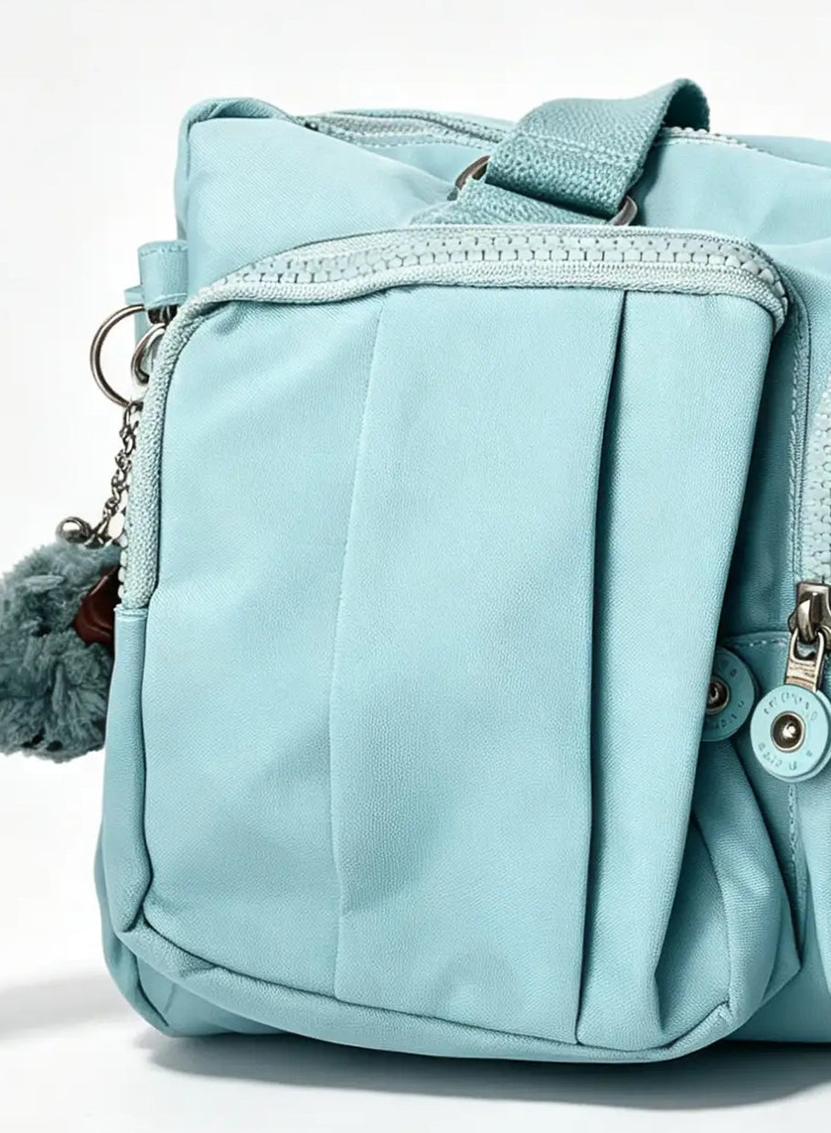 شنطة يد أزرق سماوي كبيرة بجيبين أماميين وميدالية حيوان | Large Sky Blue Handbag with Double Front Pockets & Animal Charm