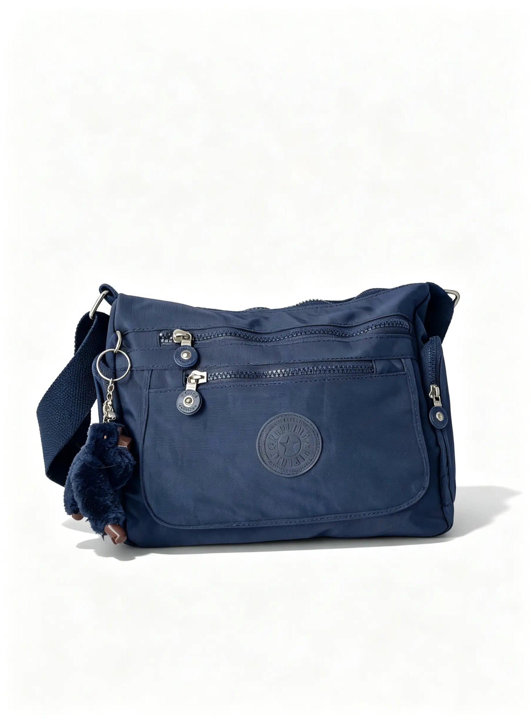 شنطة كروس كحلي متعددة الجيوب وميدالية حيوان | Navy Crossbody Bag with Multiple Pockets & Animal Charm