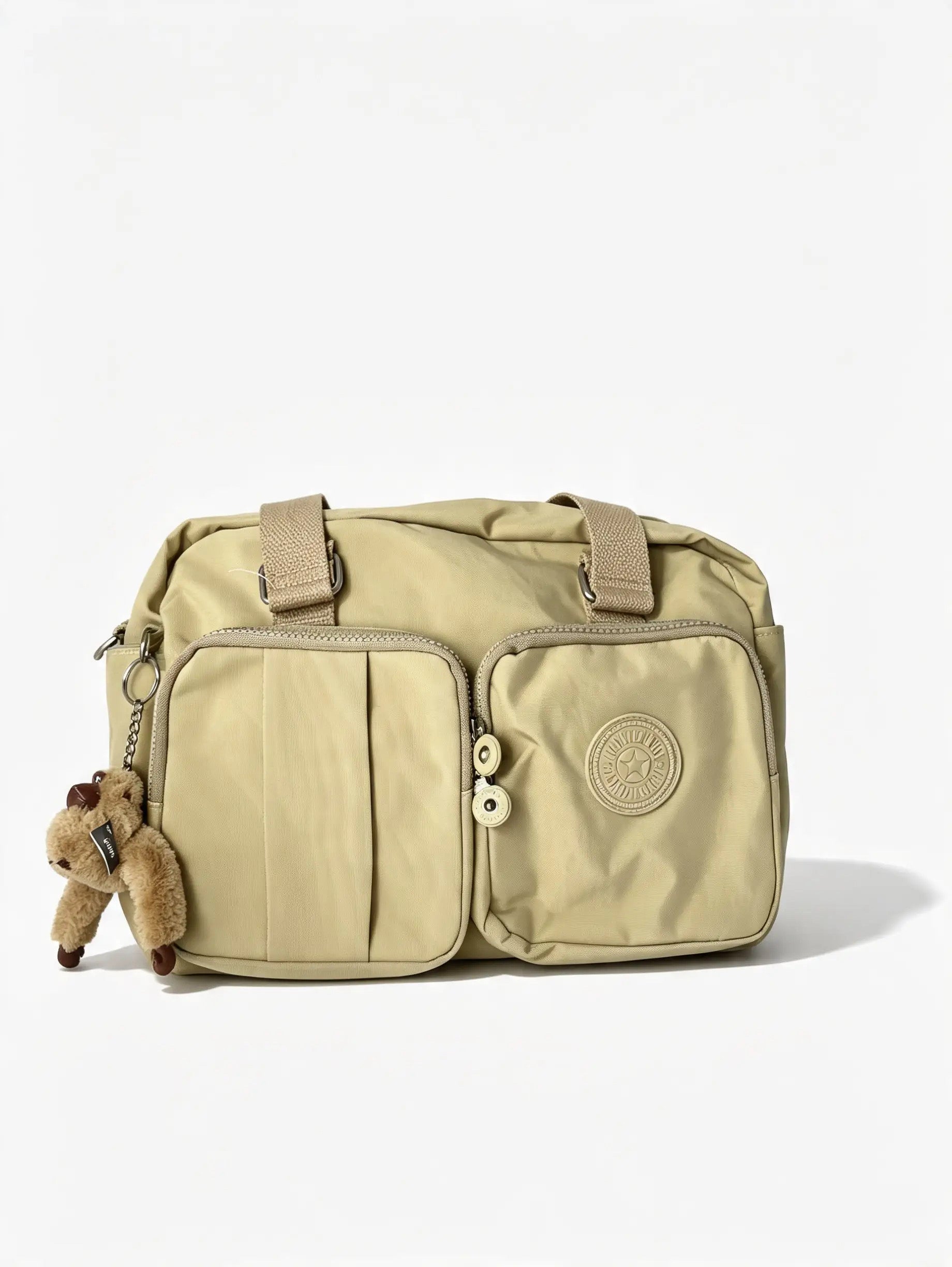 شنطة يد حريمي كبيرة بيج بجيبين أماميين وميدالية حيوان | Large Beige Women's Handbag with Double Front Pockets & Animal Charm