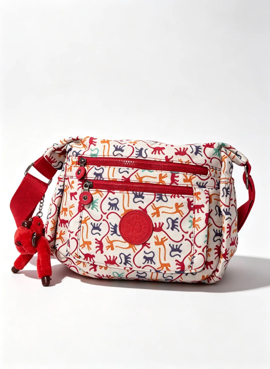 شنطة كروس حريمي بيج بطبعة حيوانات كرتونية ملونة | Beige Women's Crossbody Bag with Colorful Cartoon Animal Print