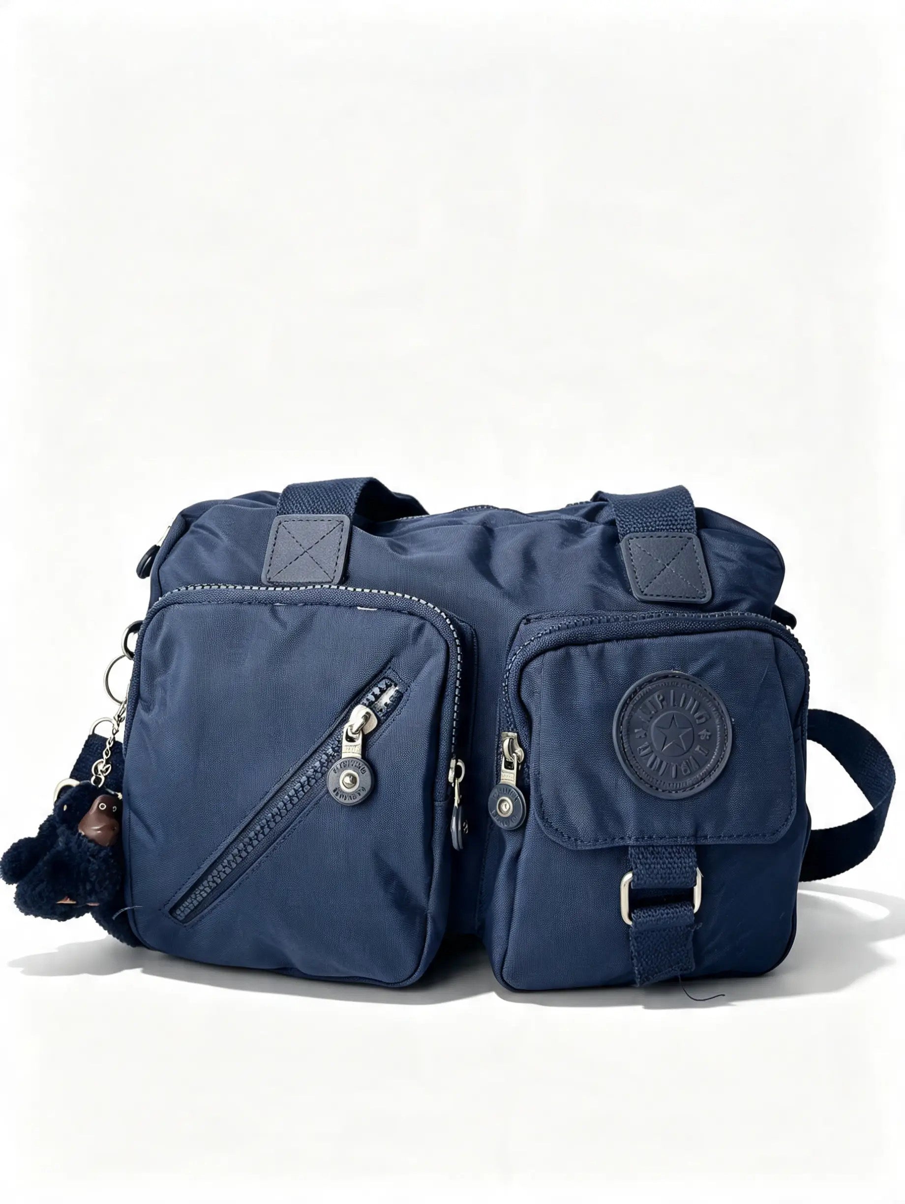 شنطة كروس كحلي بجيبين أماميين وميدالية حيوان | Navy Crossbody Bag with Double Front Pockets & Animal Charm