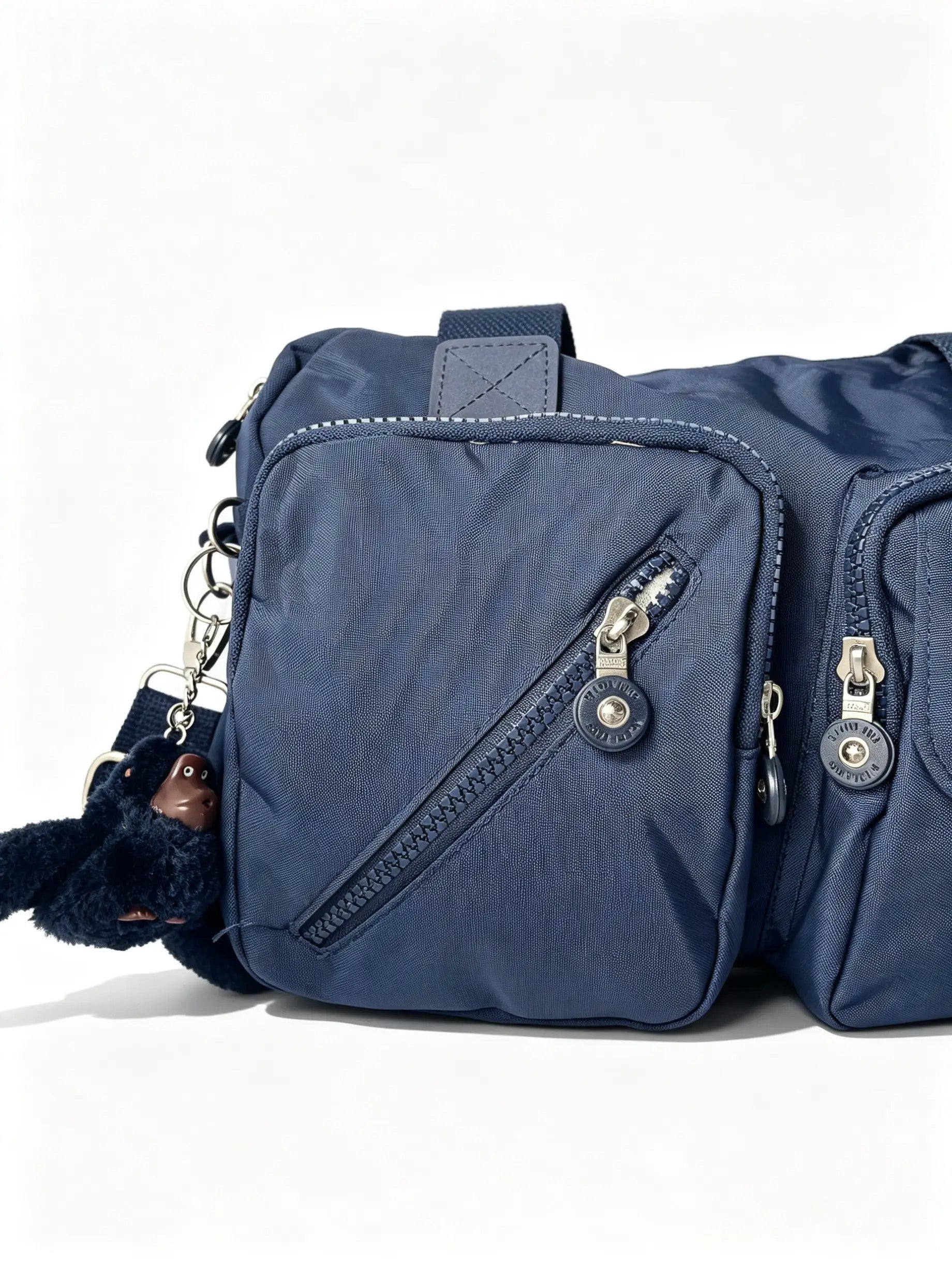 شنطة كروس كحلي بجيبين أماميين وميدالية حيوان | Navy Crossbody Bag with Double Front Pockets & Animal Charm