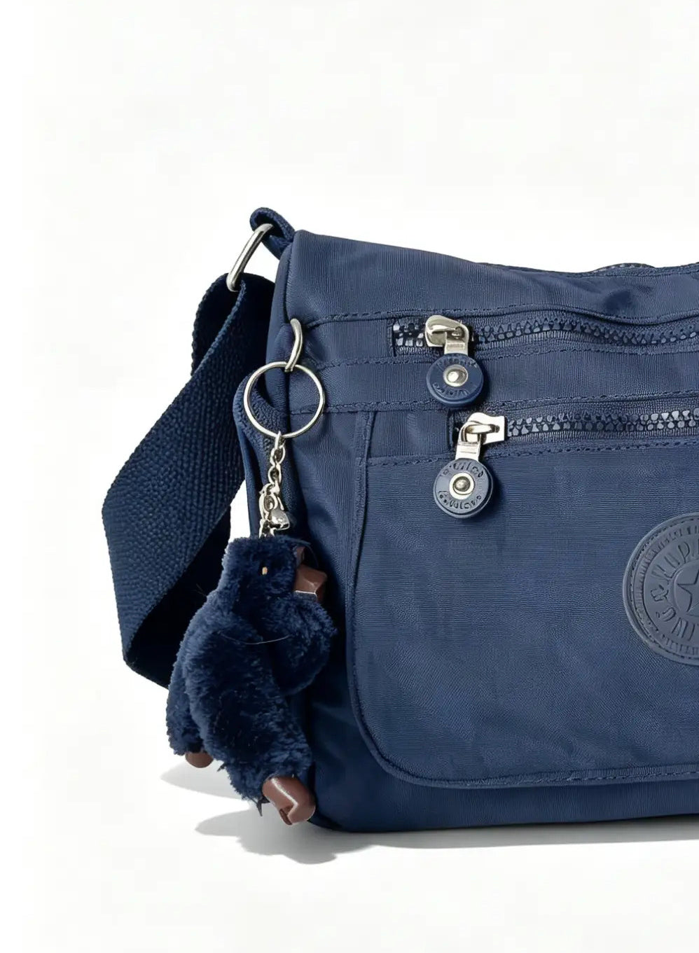 شنطة يد كحلي بجيب أمامي واسع وميدالية حيوان | Navy Handbag with Large Front Pocket & Animal Charm