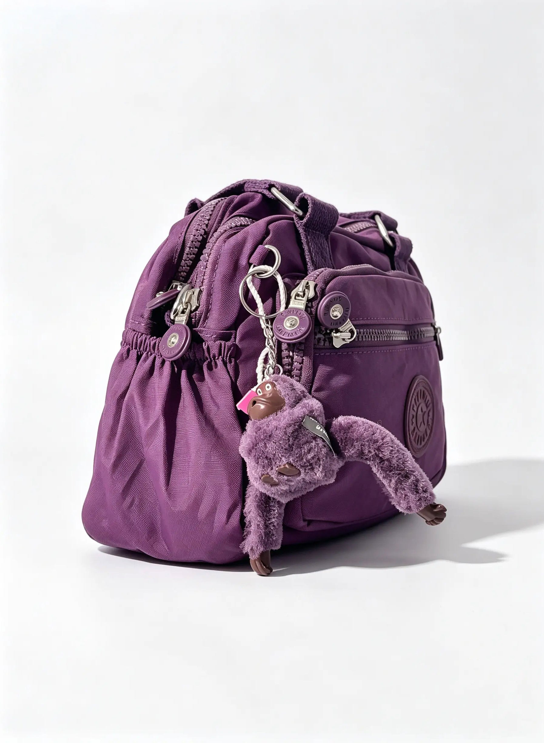 شنطة يد حريمي متوسطة بنفسجي بجيب أمامي وميدالية حيوان | Medium Purple Women's Handbag with Front Pocket & Animal Charm